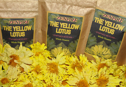 Three packages of 'The Yellow Lotus' flowers with yellow lotus flowers in front