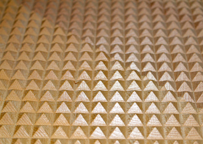 closeup of wooden sadhu spike board