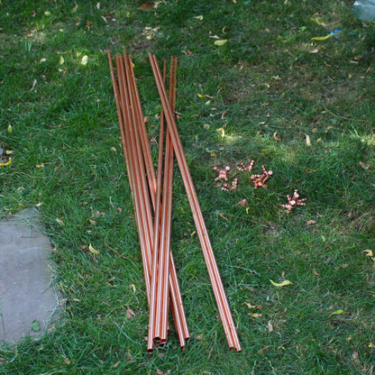 copper pipes and copper connector pieces used to assemble large copper octahedron pyramid healing system.